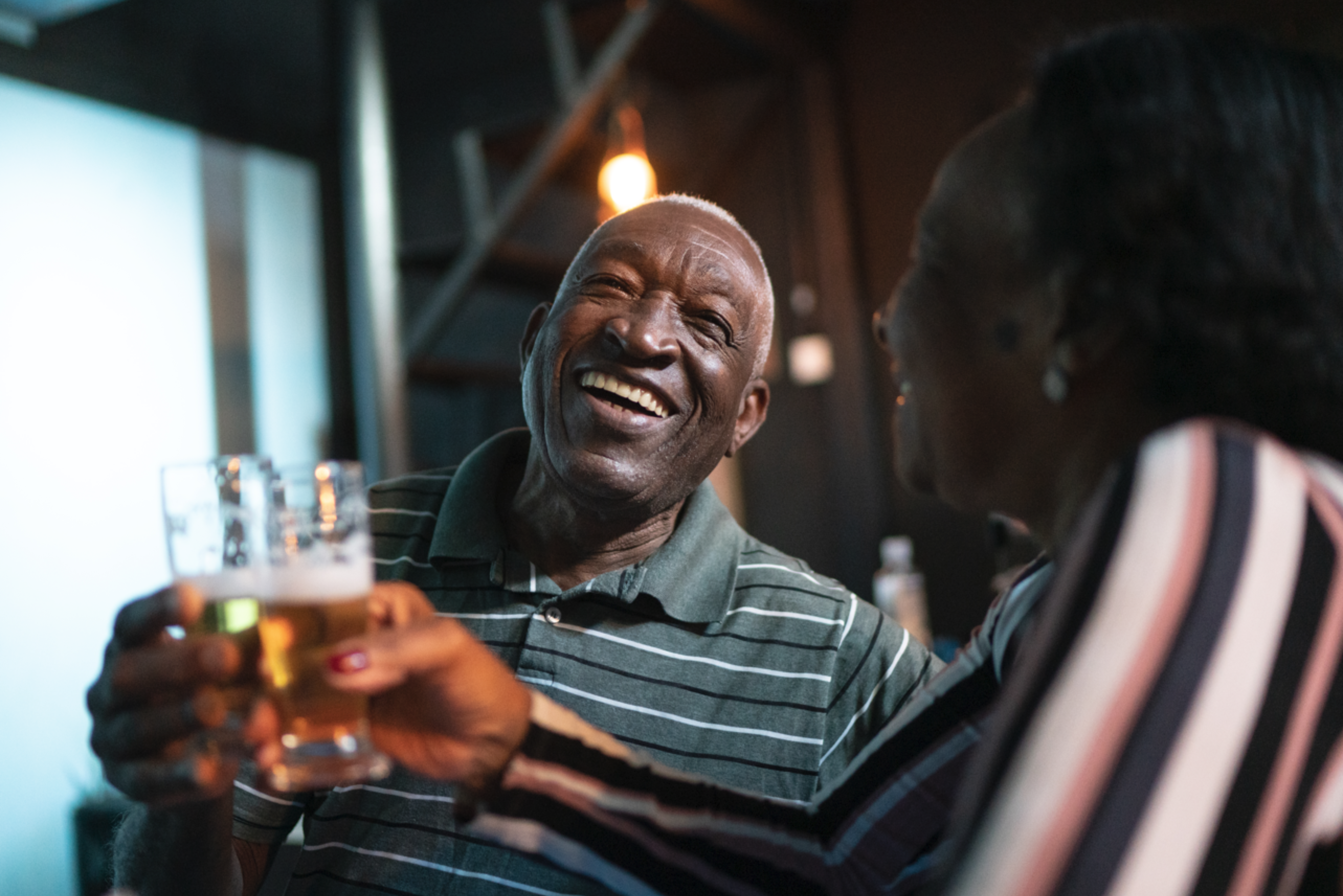 Elderly man drinking